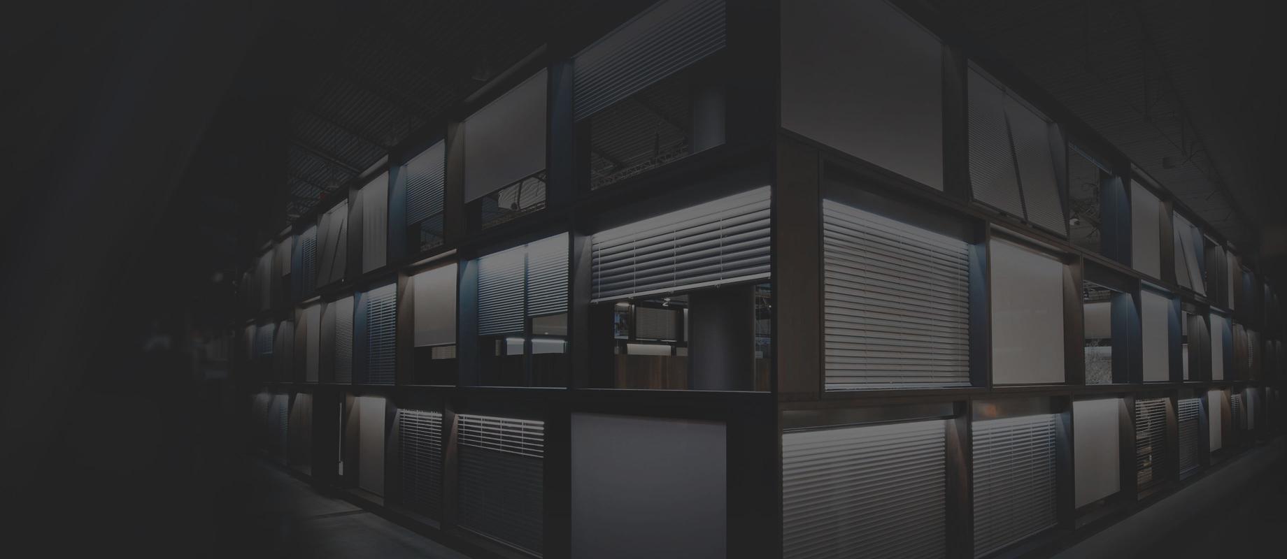 Booth consisting of a three-storey wall with different product samples