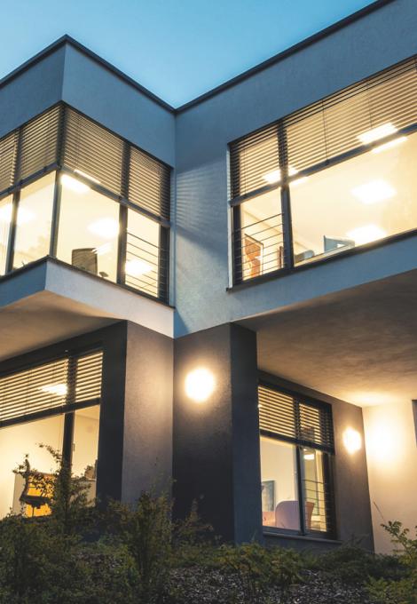 Modern office buidling with interior lighting in the twilight