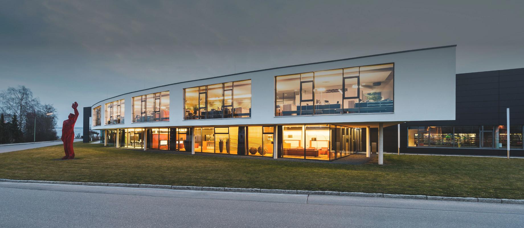 ROMA Location Burgau with interior lighting in the twilight