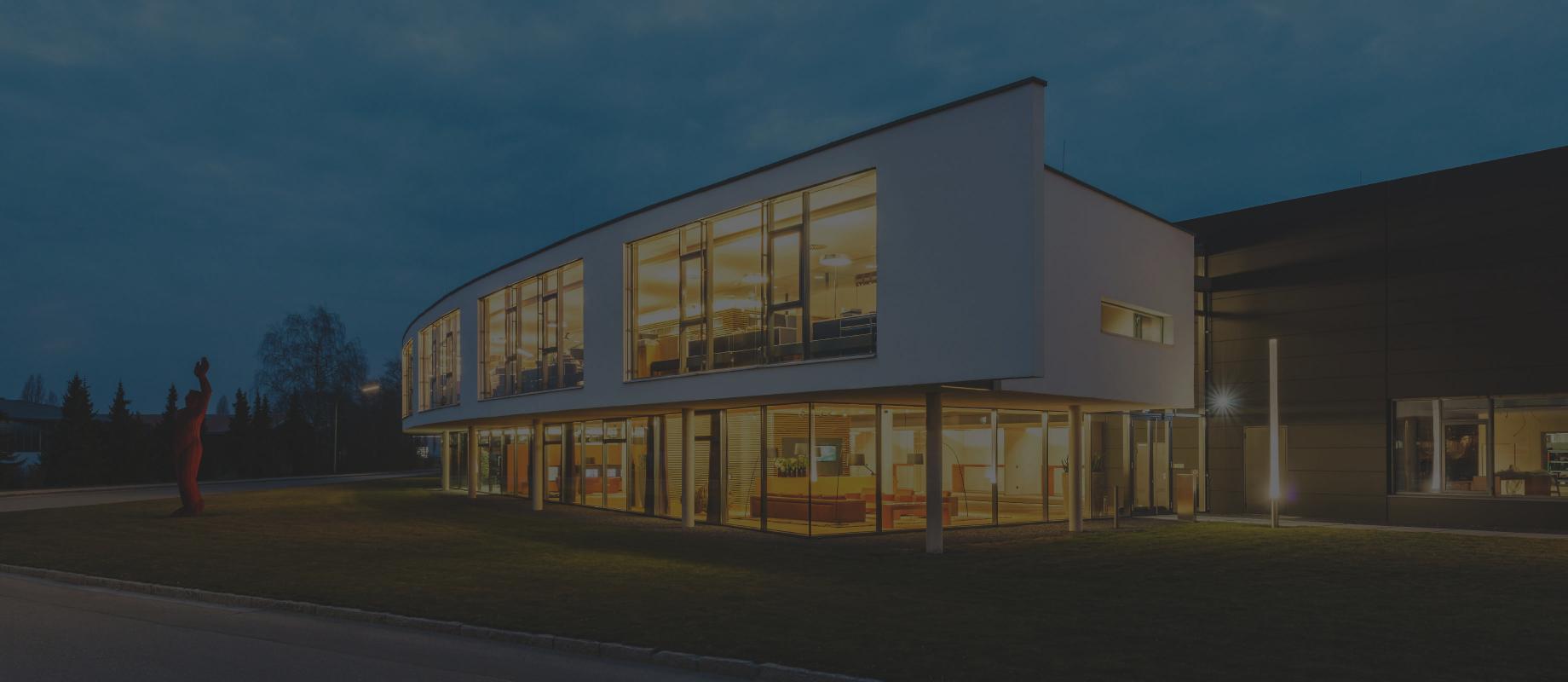 ROMA Location Burgau with interior lighting in the twilight