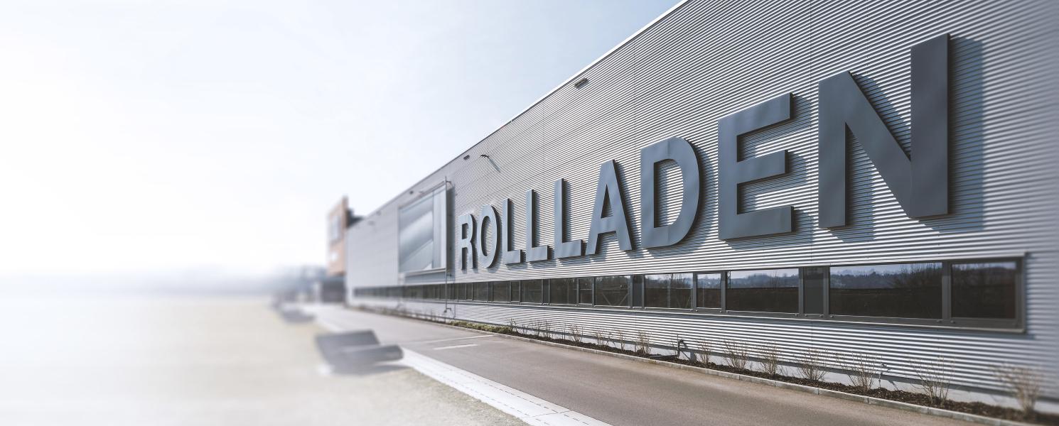 Long hall with enormous lettering "roller shutters" by daylight