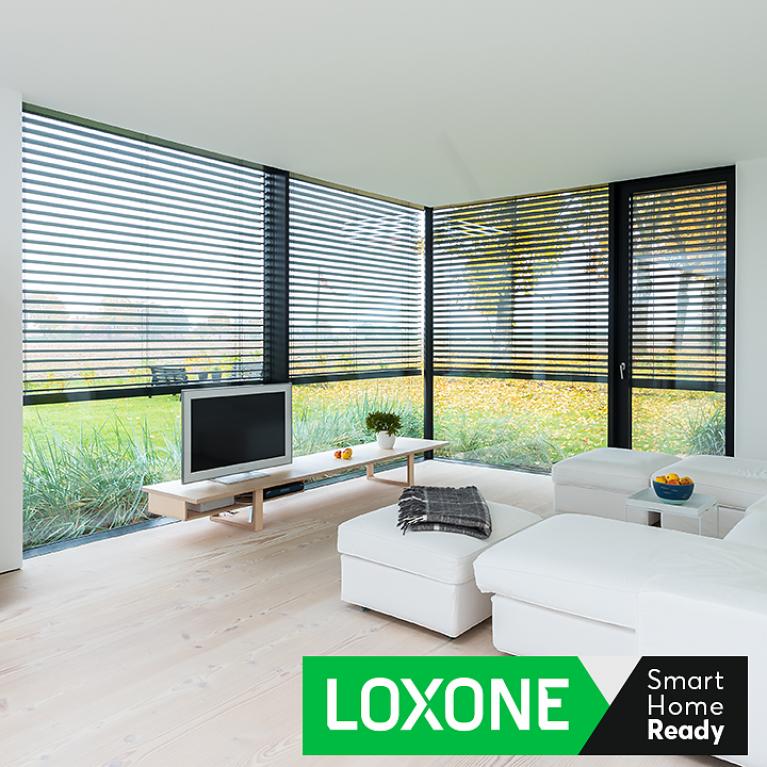 Loxone Smart Home living room with half-closed external venetian blinds