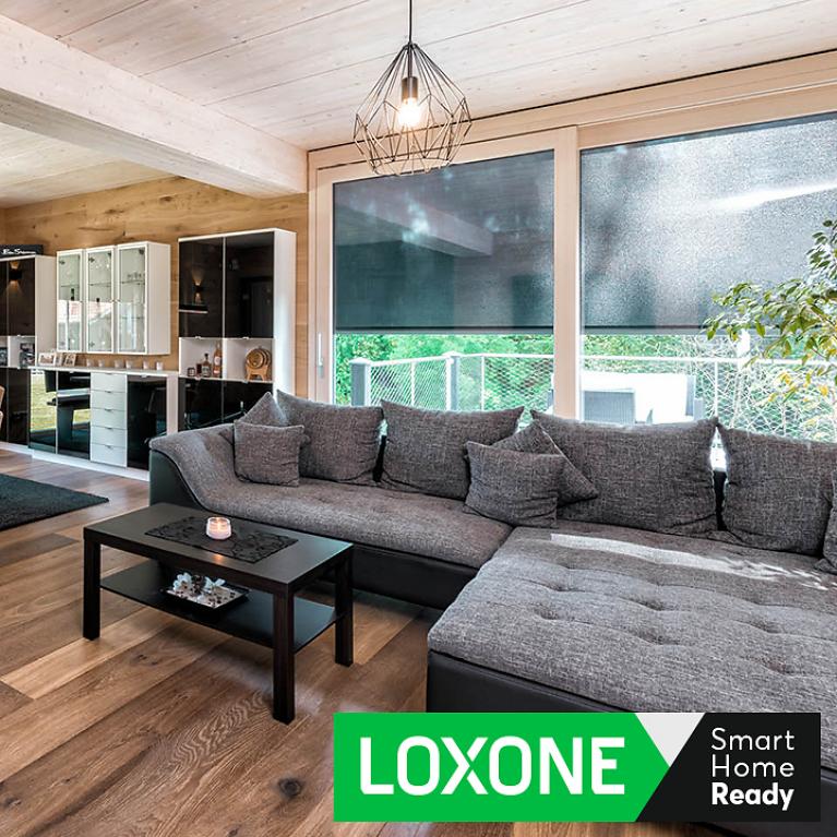 Loxone Smart Home living room with half-closed external venetian blinds