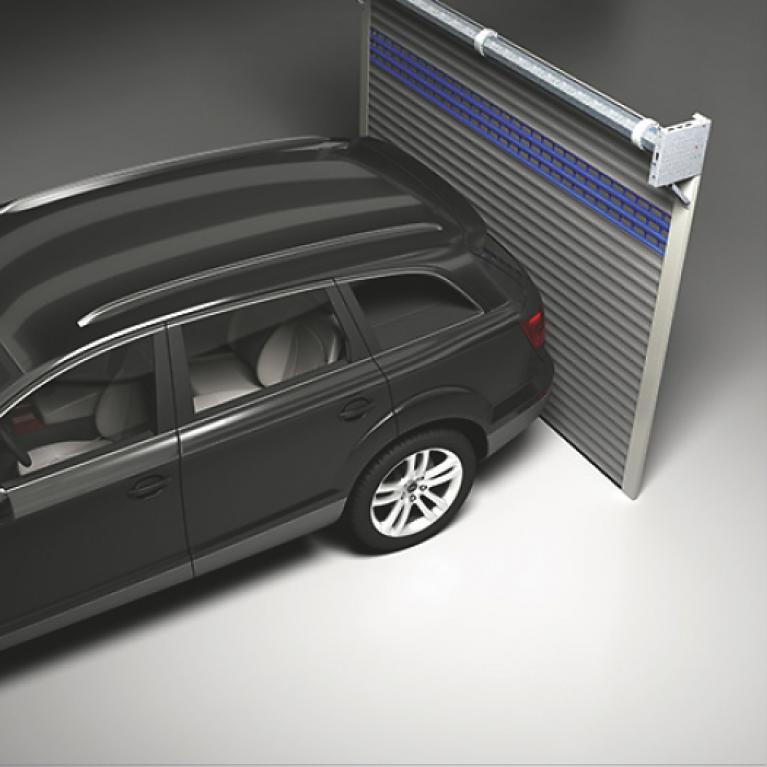 Roller door model side view with BMW Touring