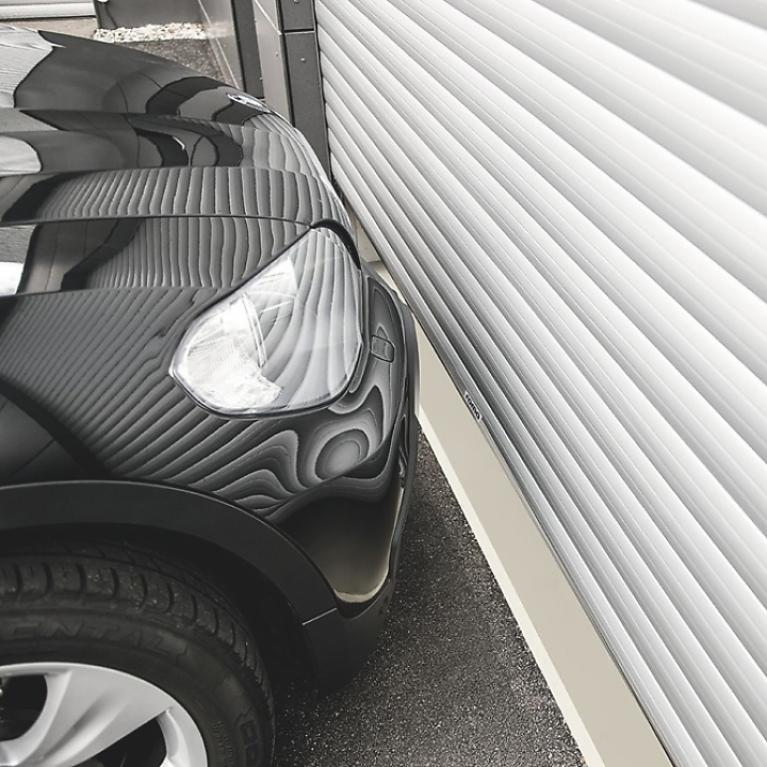 ROMA Garage Door Detail side view BMW 1 in front of garage door