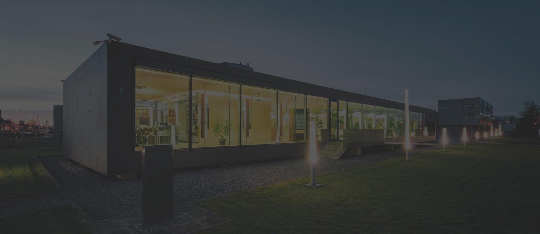 ROMA forum Zevenbergen Netherlands with interior lighting in the twilight