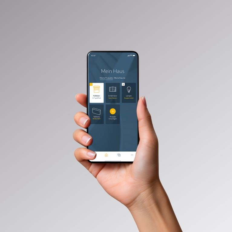 Image hand with smartphone and opened Somfy app
