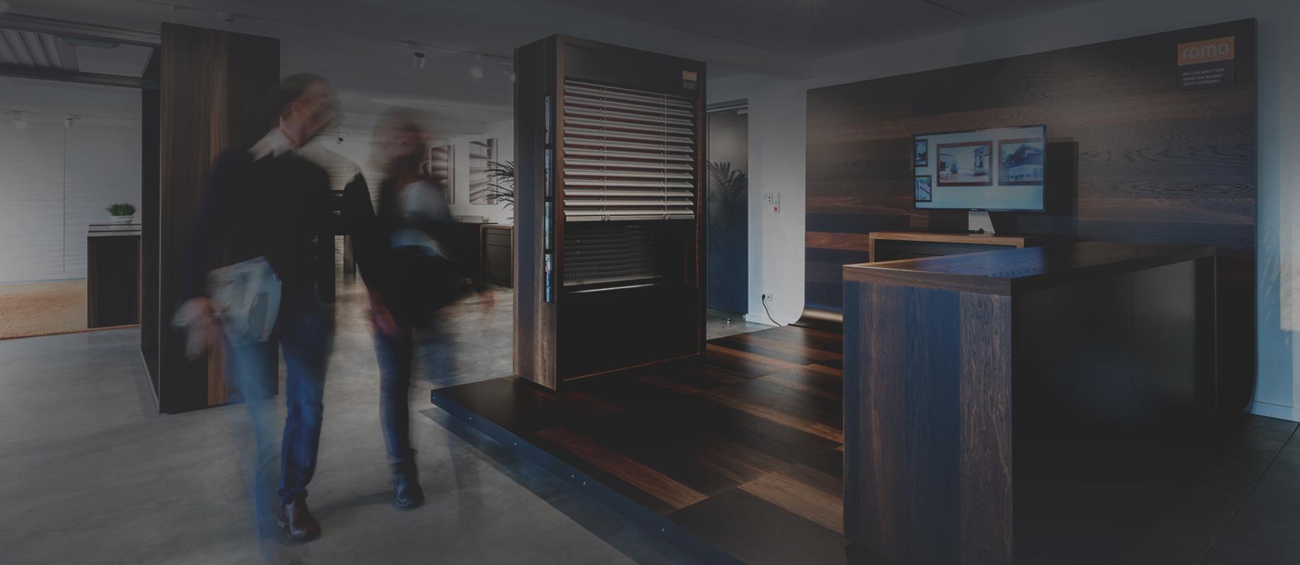 Image Showroom and two blurry persons